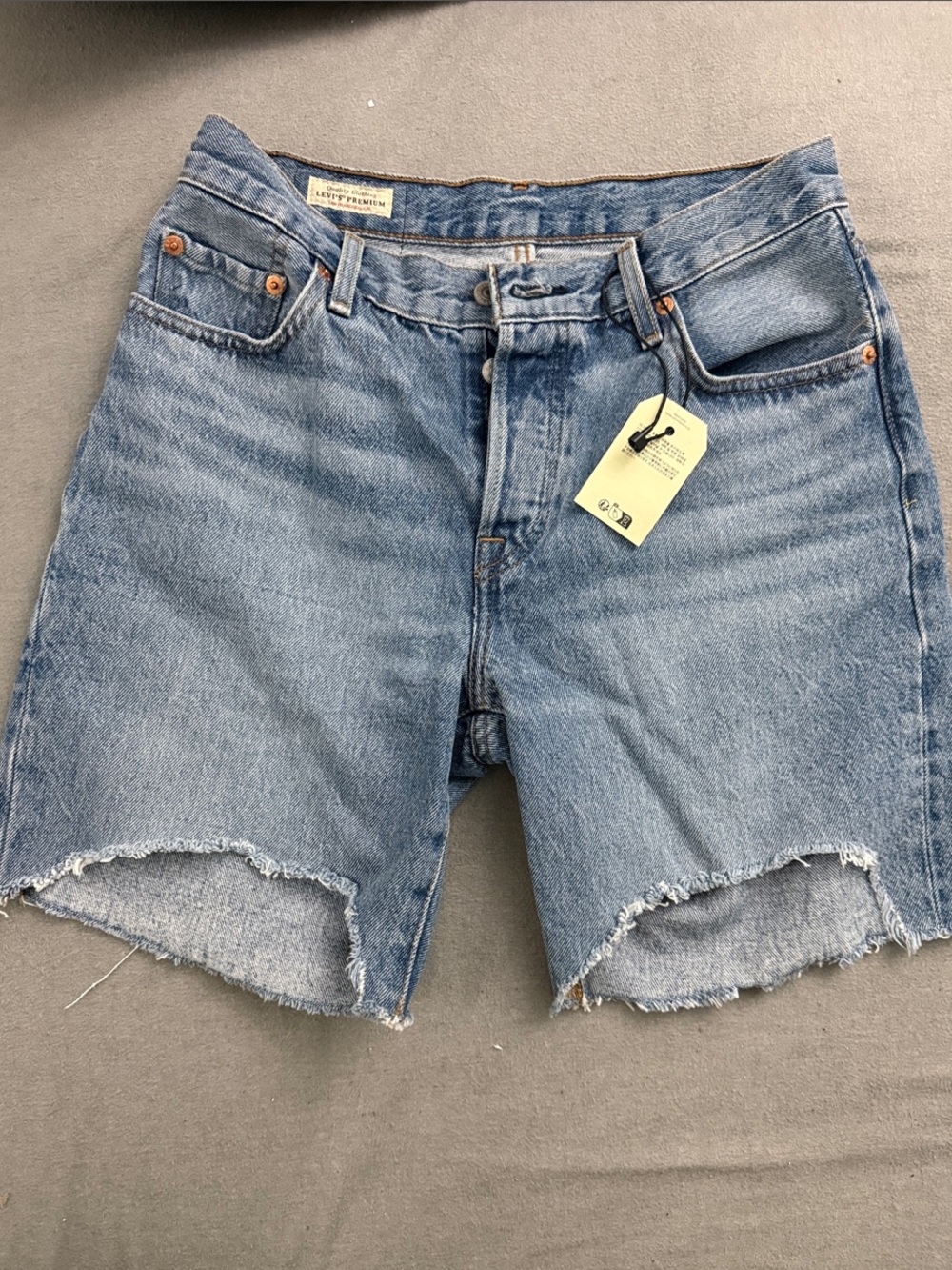 Levi's Light Blue Raw Hem Denim Shorts